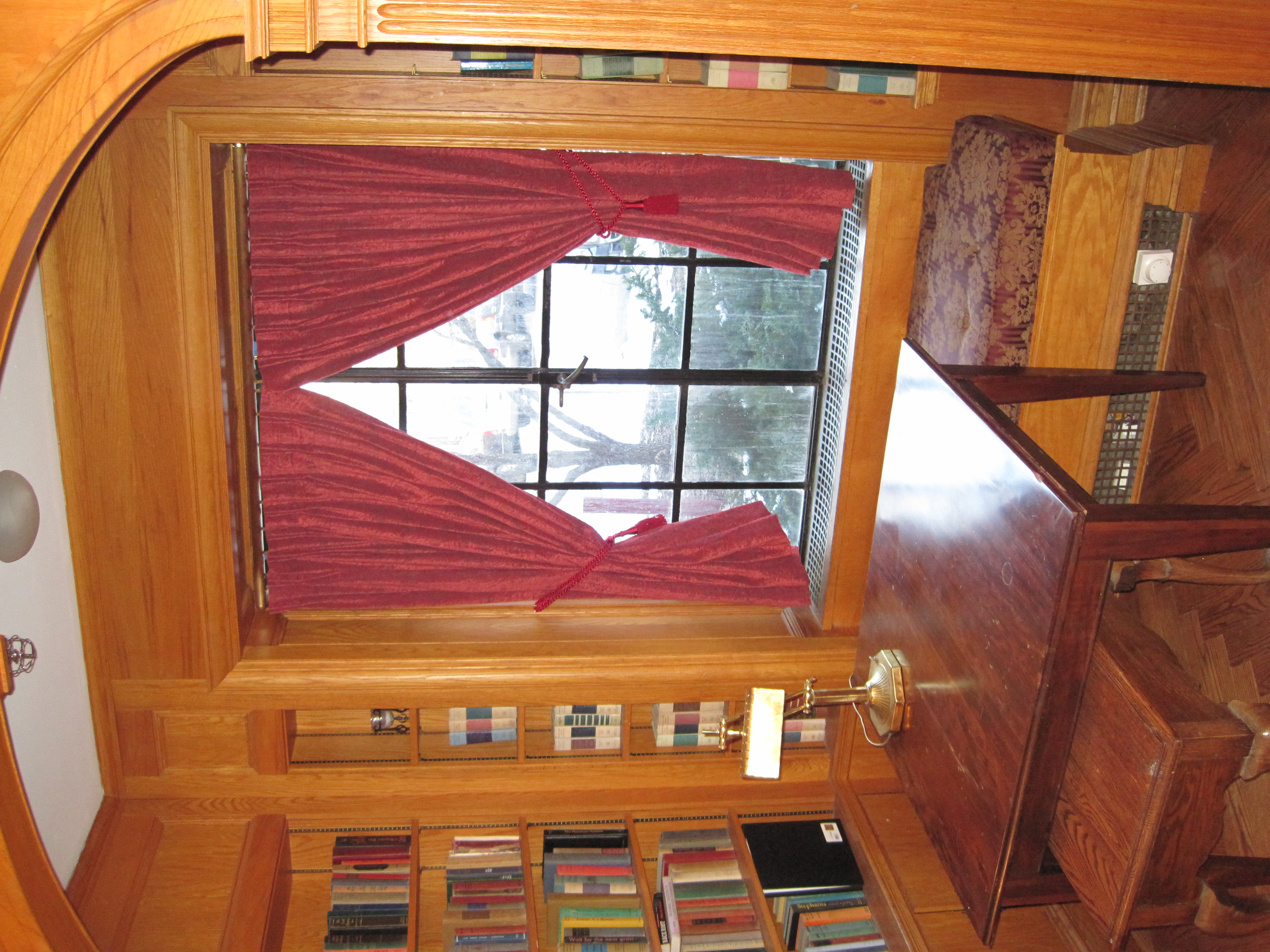 The wood-paneled library at 2 Forest Park Lane
